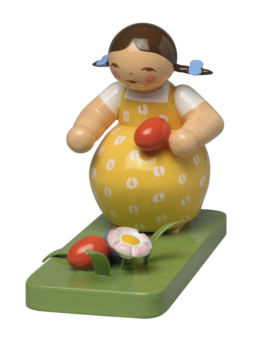 Meisje met paaseieren