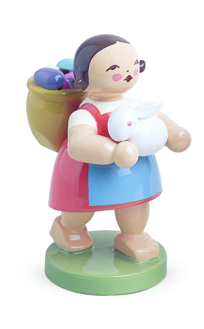 Meisje met op haar rug mand met eieren